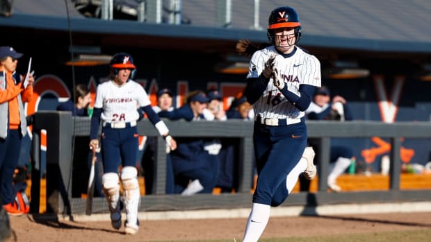 MC Eaton scores a run during the Virginia softball game against Delaware at Palmer Park.